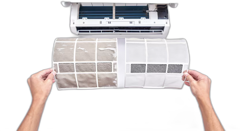 Dirty and clean air conditioner filters held side by side in front of a split system